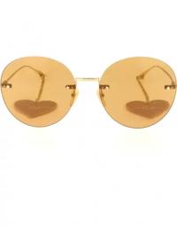 Stilfulde solbriller i guld og brun