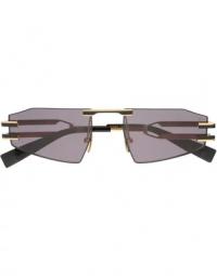 Gyldne firkantede solbriller med tonede linser