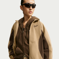 Oversized Nike -løbejakke i jernbanefløjl til kvinder - brun