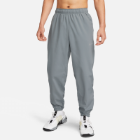 Faconsyede, alsidige Nike Form Dri-FIT-bukser til mænd - grå