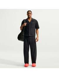 Nike 24.7 PerfectStretch Dri-FIT-bukser med UV-beskyttelse og barrel-ben til mænd - sort