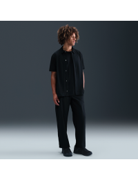 Nike 24.7 PerfectStretch Dri-FIT-chinobukser med løs pasform til mænd - sort